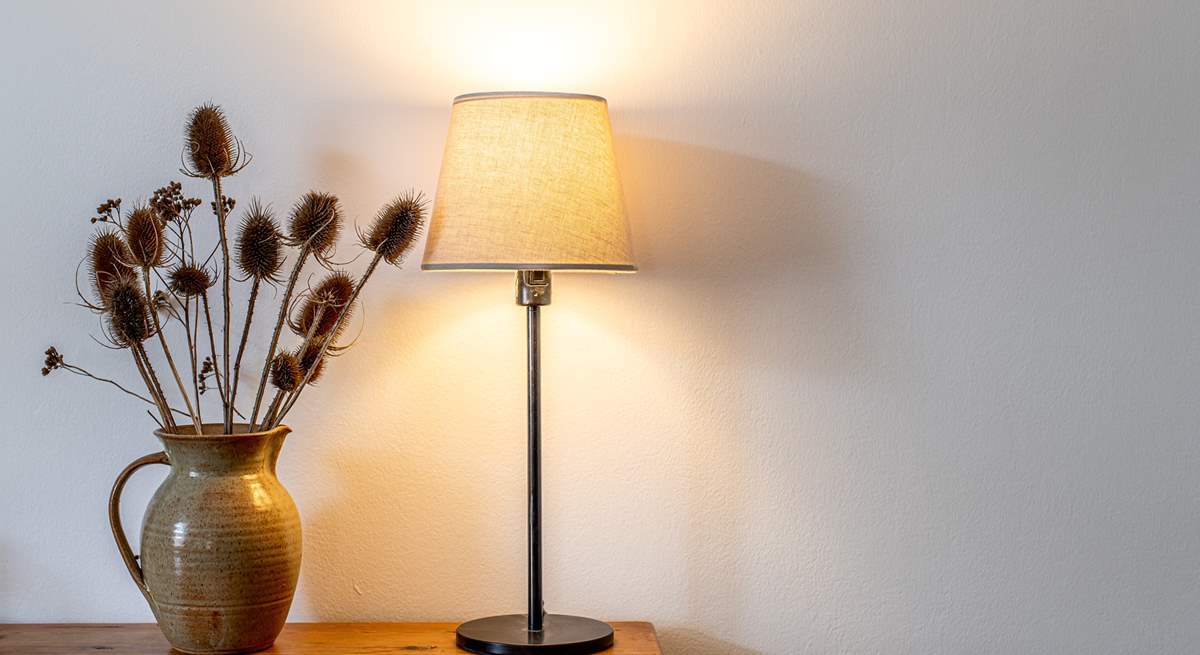 Pretty features throughout this sweet cottage.