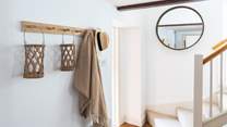 Head up the stairs to explore the peaceful bedrooms.
