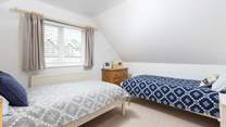 The twin room has been thoughtfully styled to maximise the space.