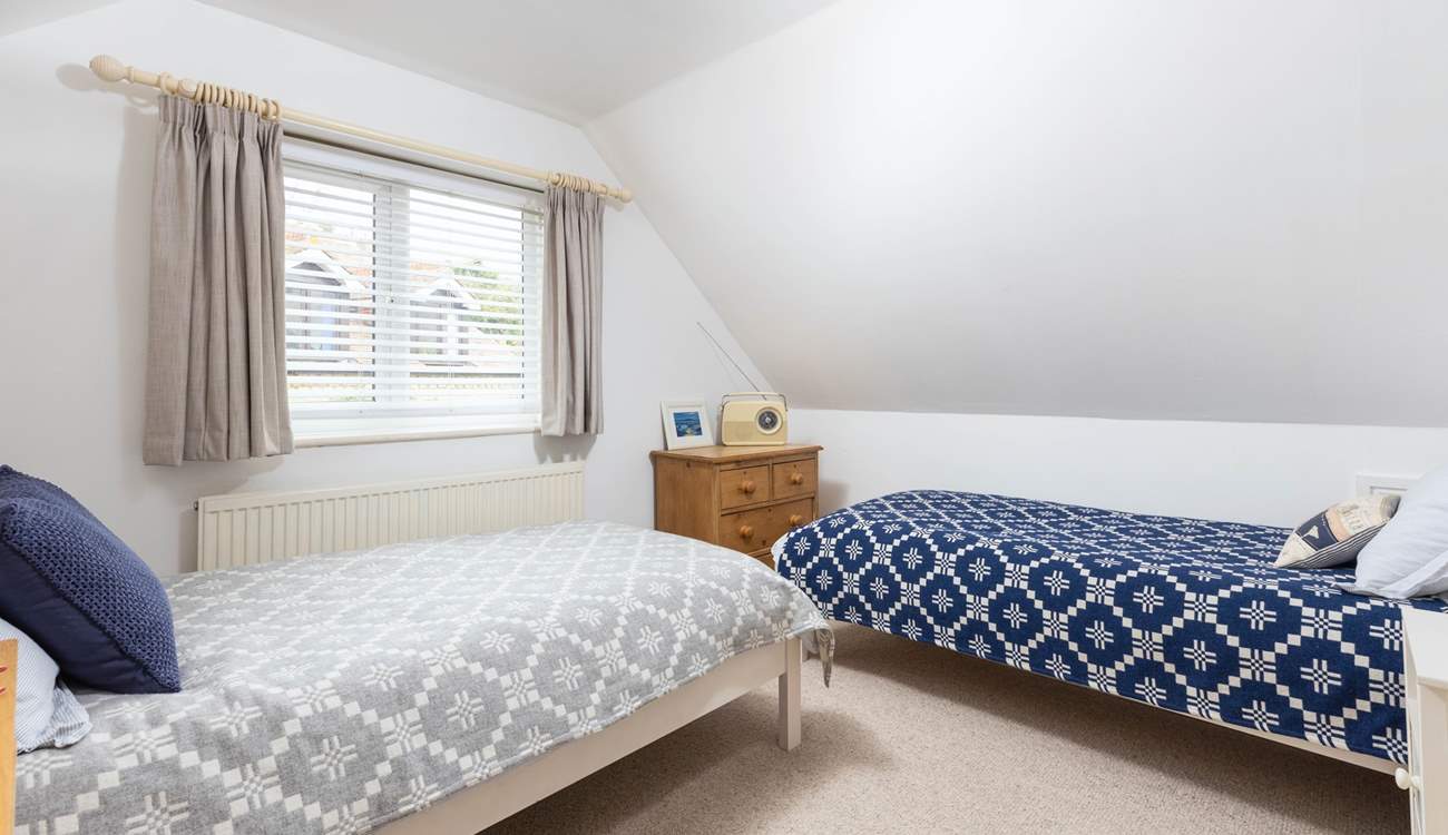 The twin room has been thoughtfully styled to maximise the space.