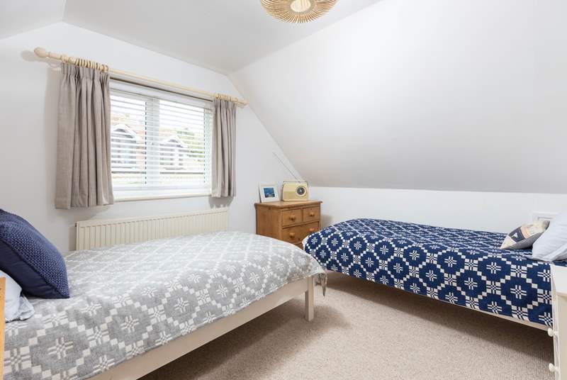 The twin room has been thoughtfully styled to maximise the space.