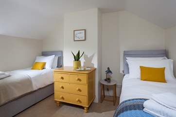 This pretty twin bedroom is perfect for younger guests.