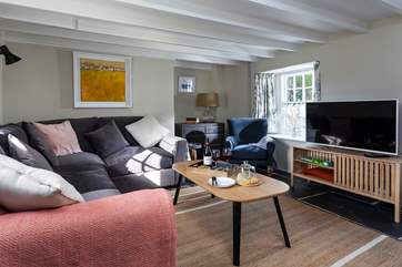 The sitting-room is made for lounging and relaxing.
