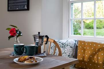 The dining-area overlooks the pretty garden.