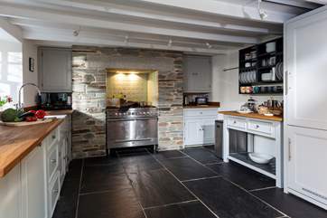 The fabulous kitchen has everything you could possibly need to cook up a feast fit for kings.