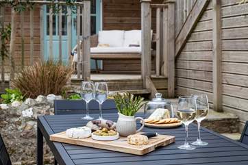 Enjoy dinner on the deck - perfect! The sofa in this photo is no longer at the property.