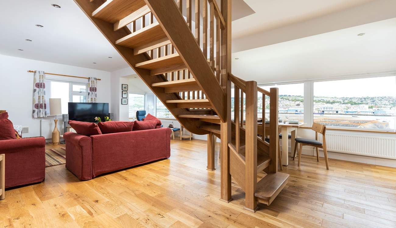 The stairs lead up from the centre of the living space to the first floor bedrooms.