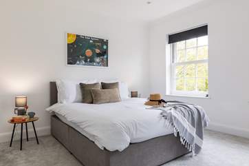 A spacious and light filled room (Bedroom 3).