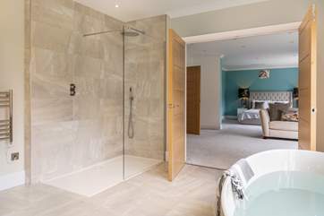 The main bedroom (Bedroom 1) has a huge en suite with walk-in shower and bath.