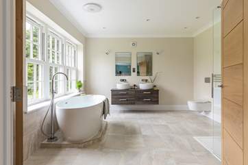 The fabulous free-standing bath invites you to relax after a day of adventures.