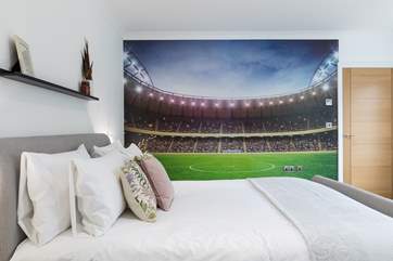 This bedroom has some fun decor (Bedroom 2).