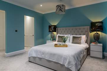 The main bedroom has a dressing room area too.