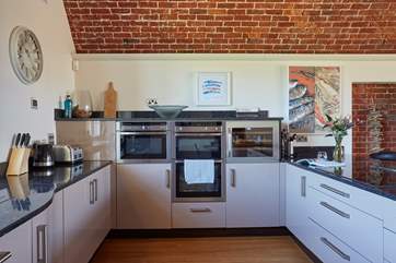 A wine cooler has been installed in the kitchen.