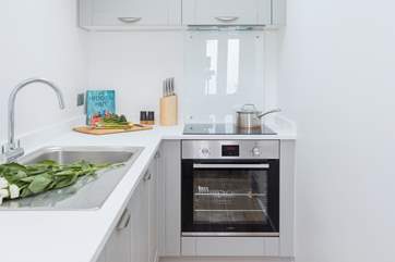 Cook up a storm in the well-equipped galley kitchen.