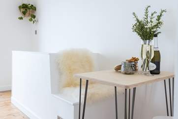 A cute little table for a tasty meal.