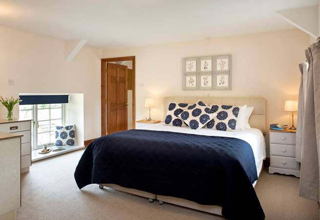 Bedroom 2 is a wonderfully spacious room with a fabulous super-king size bed and an en suite shower-room.