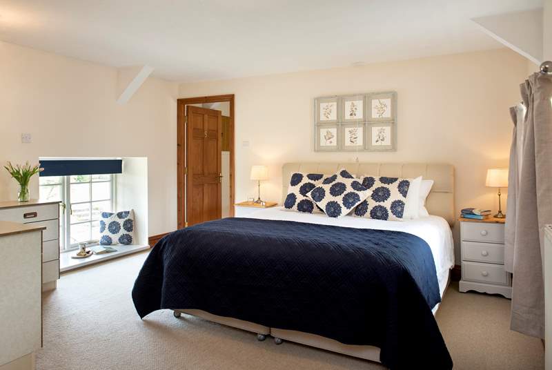 Bedroom 2 is a wonderfully spacious room with a fabulous super-king size bed and an en suite shower-room.