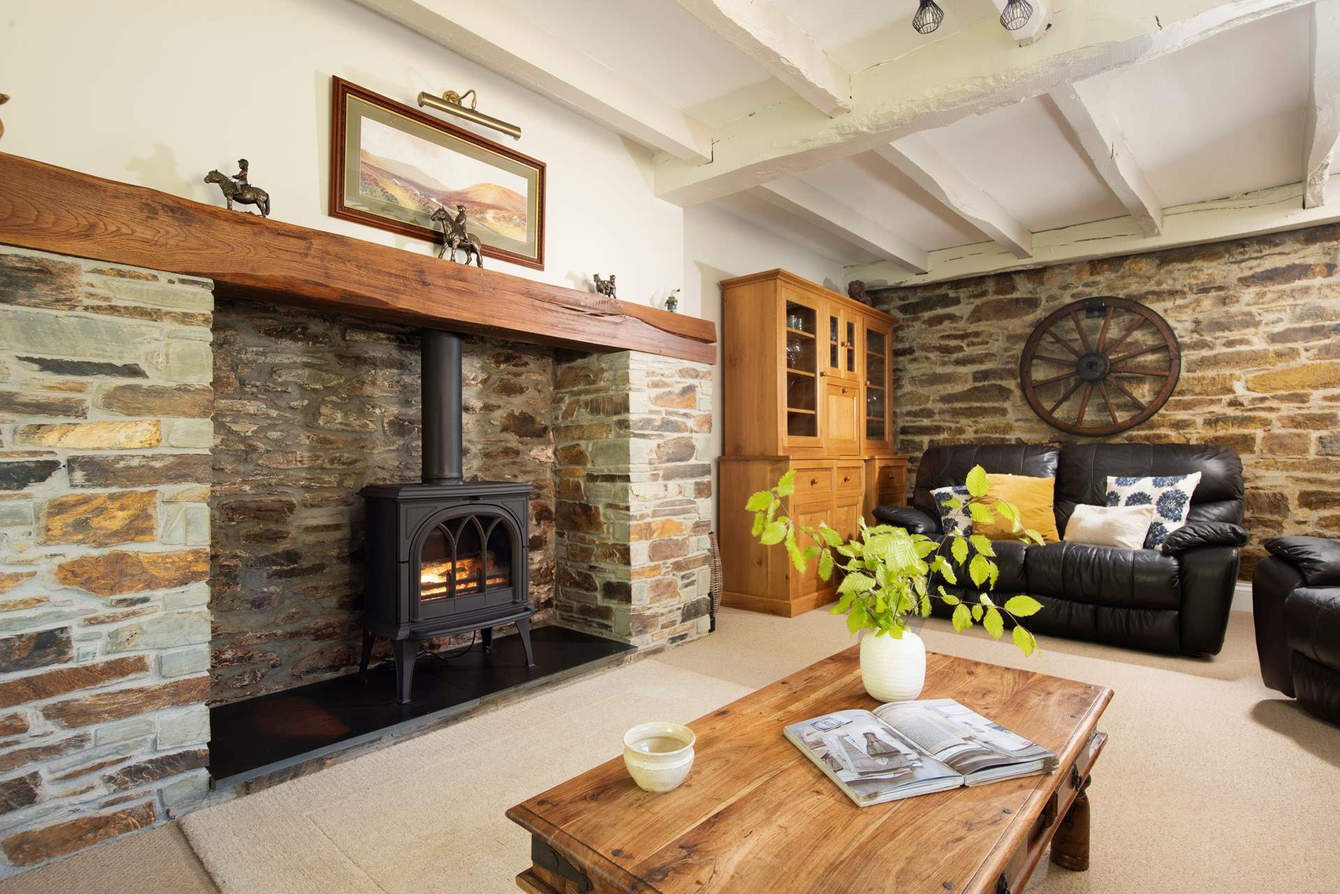 The wood-burner effect electric stove, a welcome sight on chillier nights.