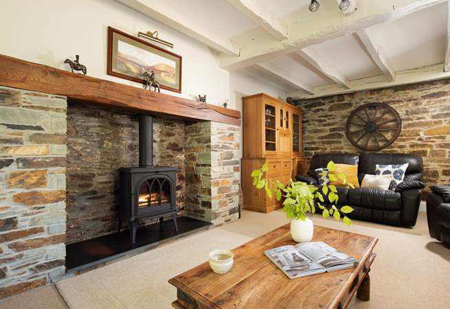 The wood-burner effect electric stove, a welcome sight on chillier nights.