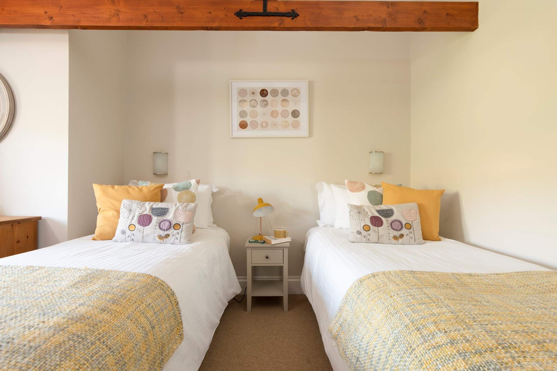 Pretty pastel shades in bedroom 3 which can be set up as twins or...