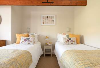 Pretty pastel shades in bedroom 3 which can be set up as twins or...