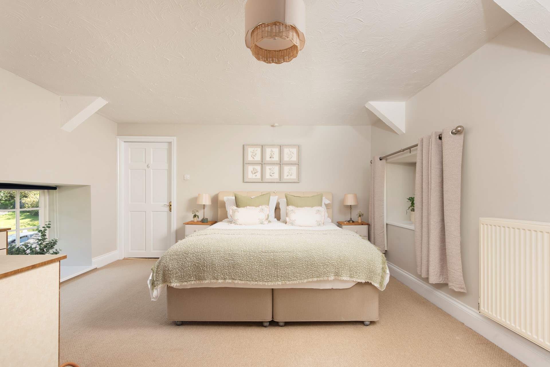 Bedroom 2 is a wonderfully spacious room with a fabulous super-king size bed and an en suite shower-room.