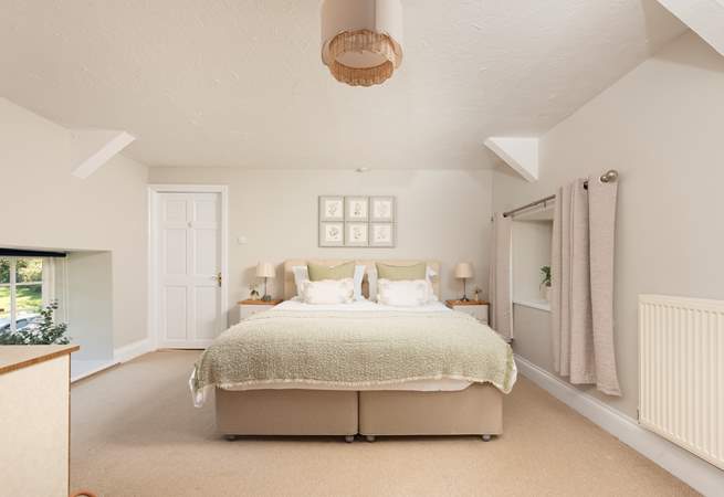 Bedroom 2 is a wonderfully spacious room with a fabulous super-king size bed and an en suite shower-room.
