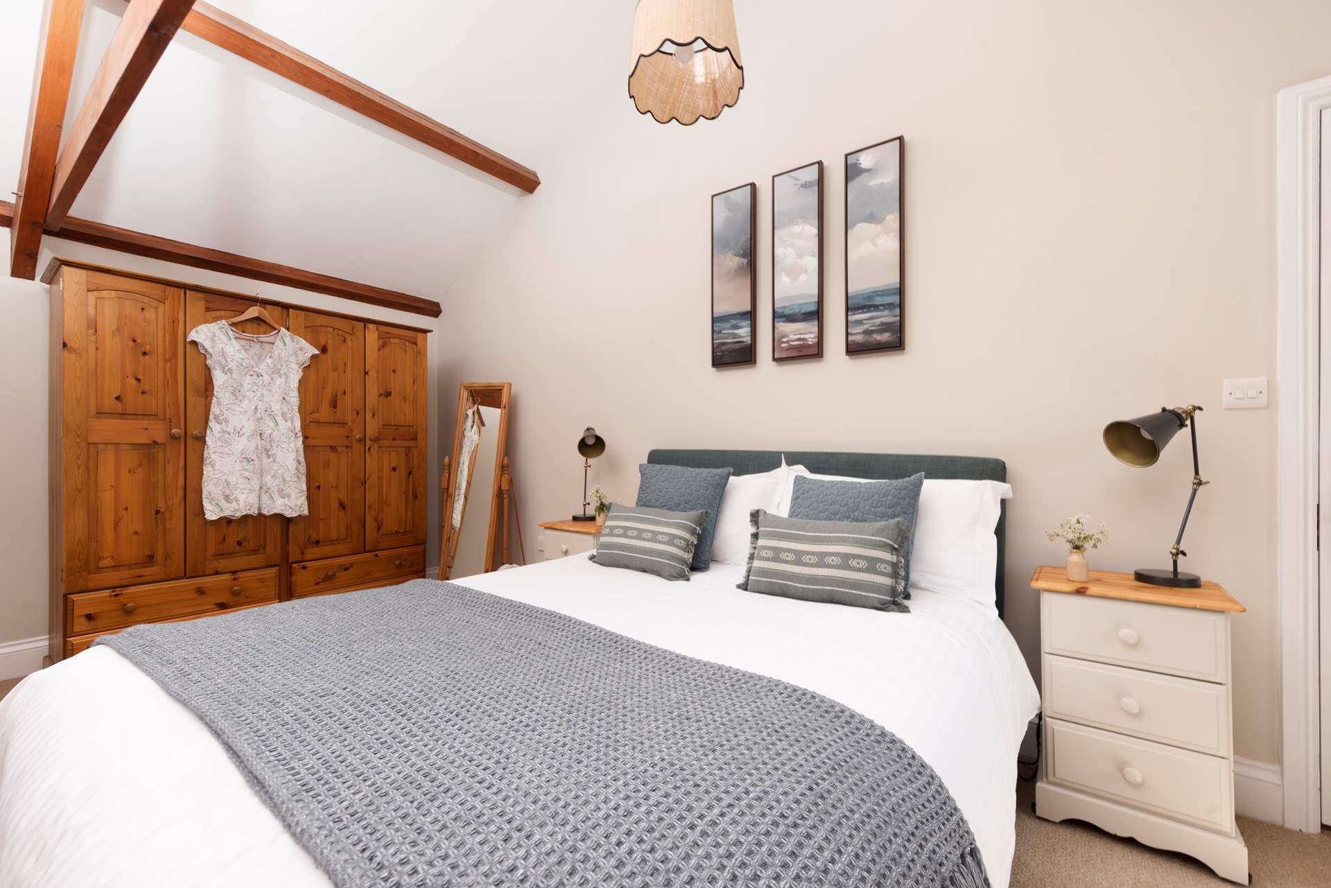A comfy king-size bed awaits.