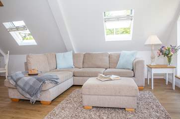 There is a super-comfy corner sofa.