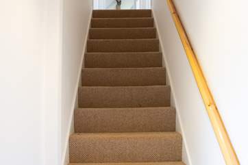Stairs lead up to the apartment.