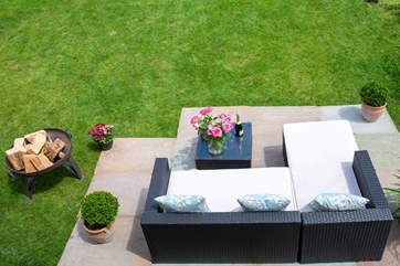 A view from the living-room window over the private patio area.