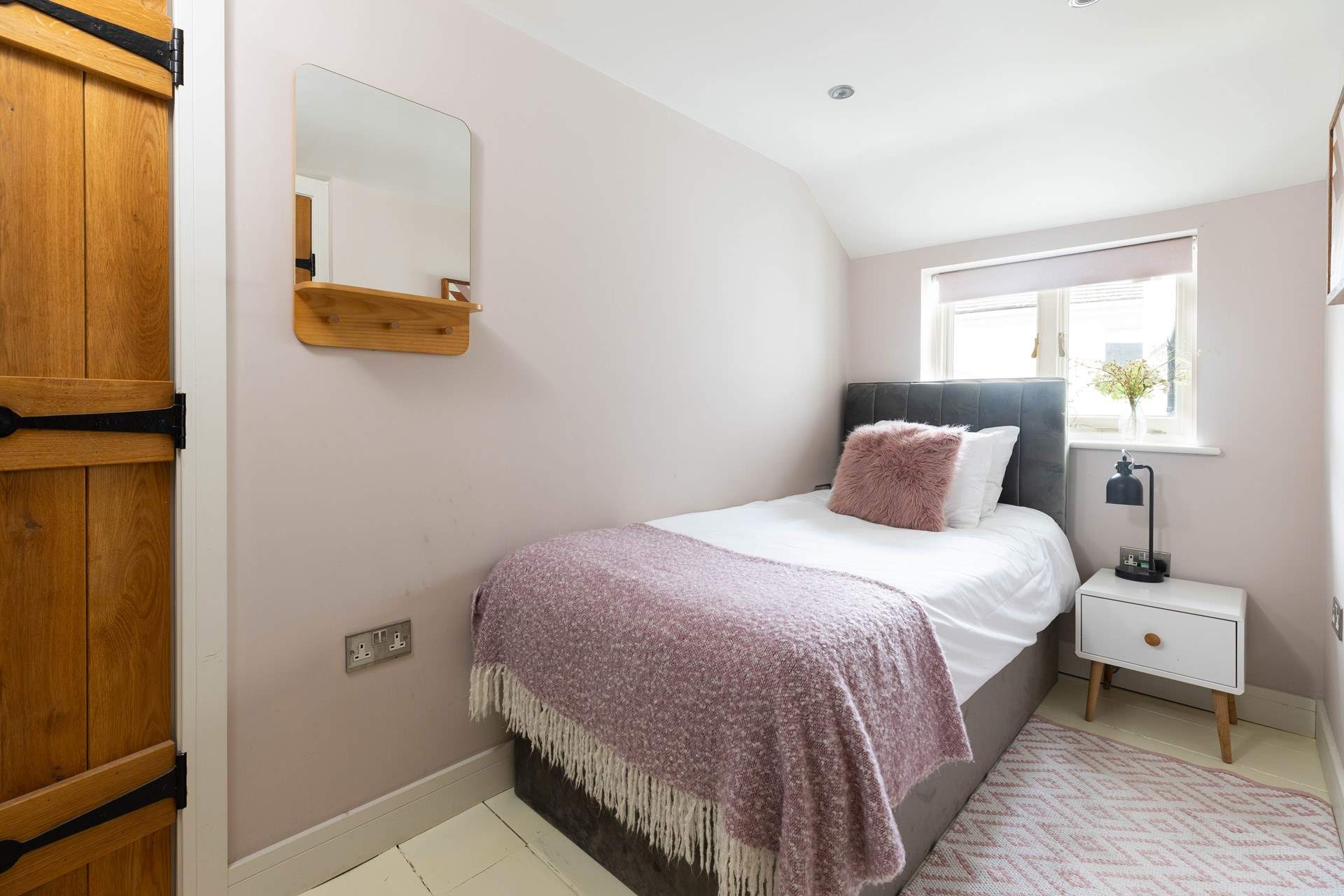 The cosy single room filled with light.