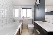 The lovely and stylish family bathroom.
