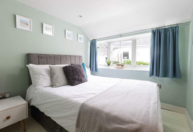 Bedroom 2 is a double and overlooks the shared courtyard.