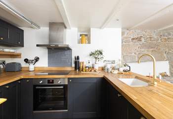 What a fabulously designed kitchen with all the equipment needed to cook up a feast.