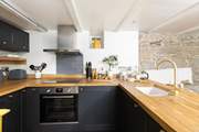 What a fabulously designed kitchen with all the equipment needed to cook up a feast.