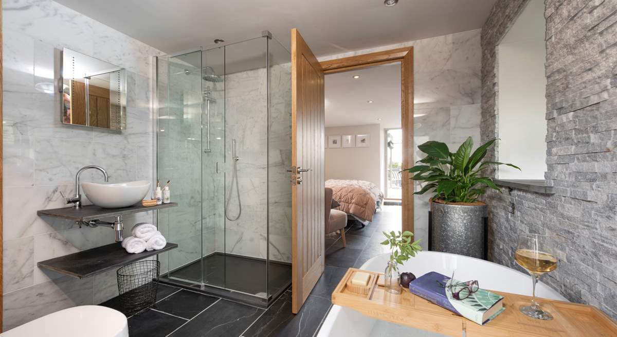 The en suite bathroom is a real treat with a super walk-in shower and free-standing bath.