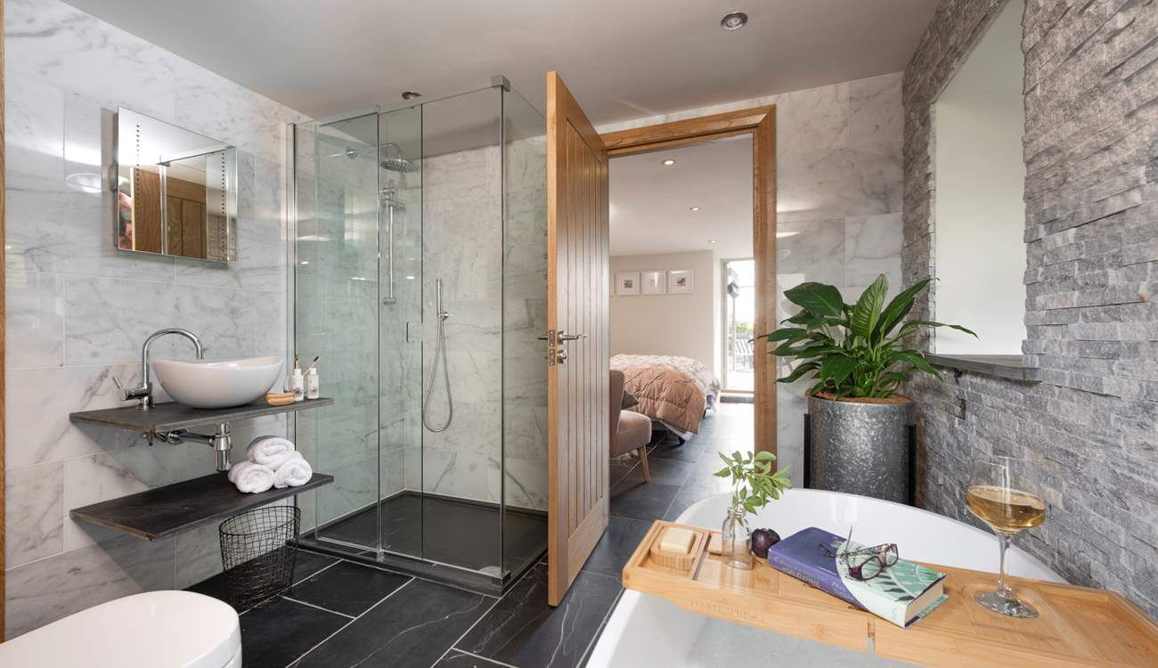 The en suite bathroom is a real treat with a super walk-in shower and free-standing bath.