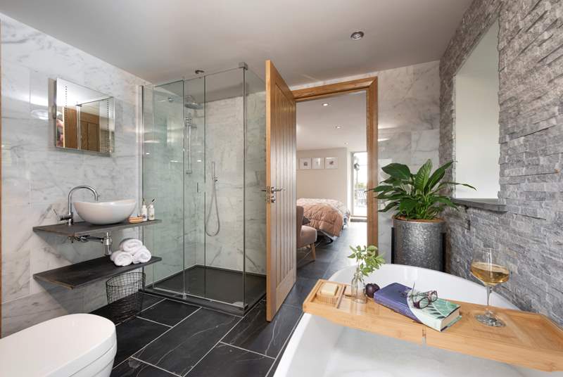 The en suite bathroom is a real treat with a super walk-in shower and free-standing bath.