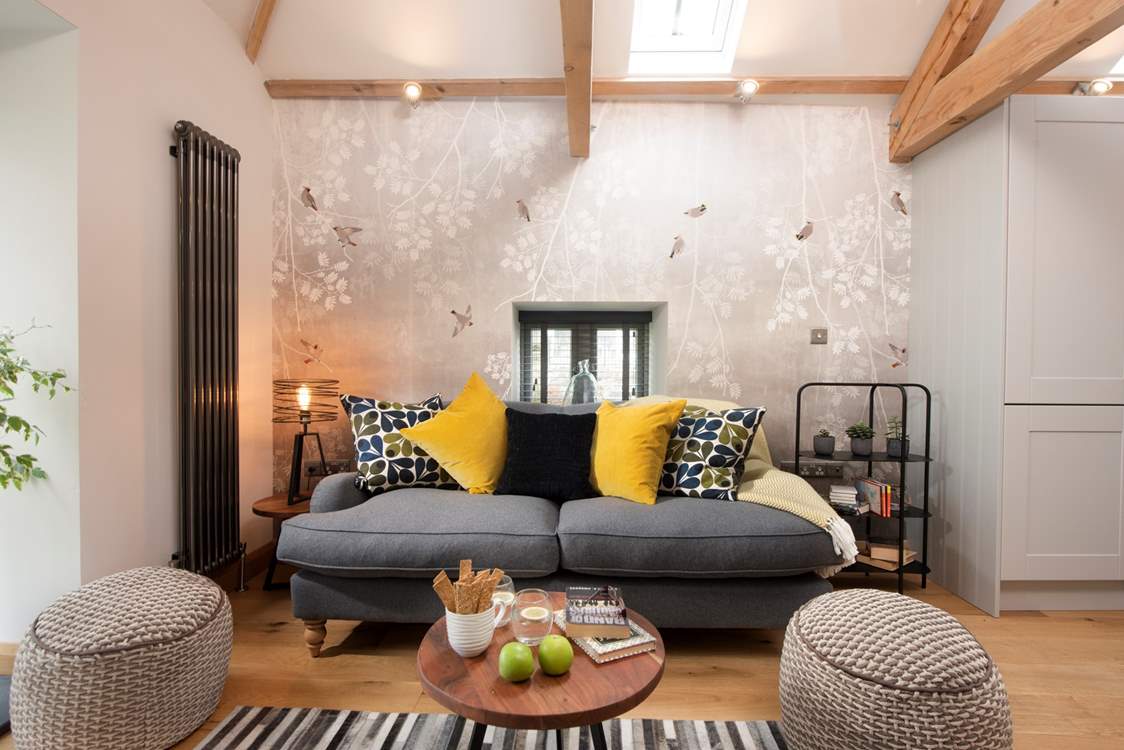 The lovely sofa invites you to snuggle up together.