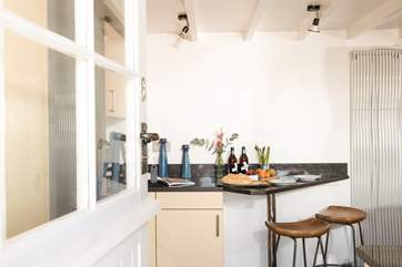 Open up the stable-door and enter into the kitchen.