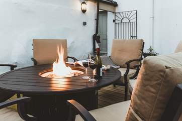 Enjoy an al fresco dinner in front of the fire-pit.
