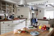 The gorgeous kitchen with its beamed ceilings and a fabulous dining space.