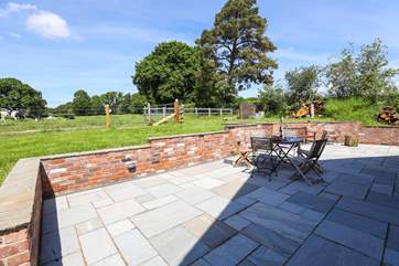 Oodles of space can be enjoyed in the rear patio - not forgetting the fabulous countryside views.