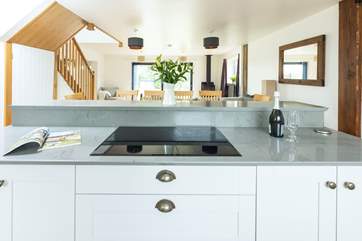 The contemporary interiors are both beautiful and practical, ideal for sociable get-togethers.