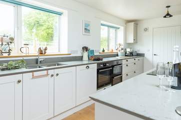 The well designed kitchen has everything close at hand.