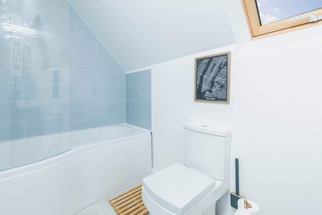 Relax in the bath in bathroom 2 after a day out exploring.