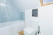 Relax in the bath in bathroom 2 after a day out exploring.