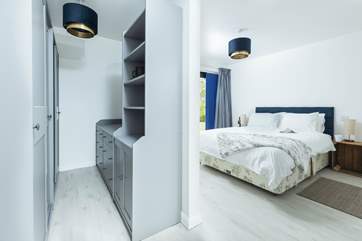 Elegant bedroom 1 has a lovely en suite shower-room and the added bonus of a walk-in dressing area.