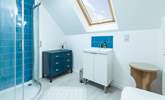 The en suite shower-room to bedroom 1 has a lovely corner shower and fills with natural light from the Velux window. - Thumbnail Image